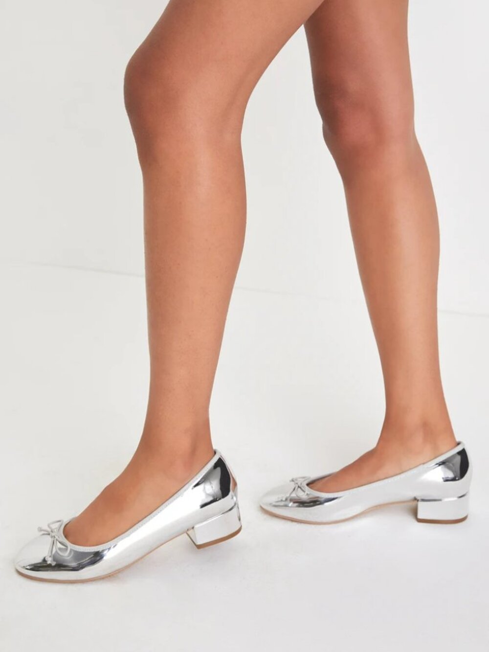 79.99 STEVE MADDEN SILVER CHERISH PATENT LOW HEELS
